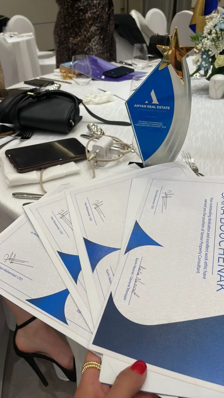 Sara Bouchenak's real-estate award and certificates of recognition